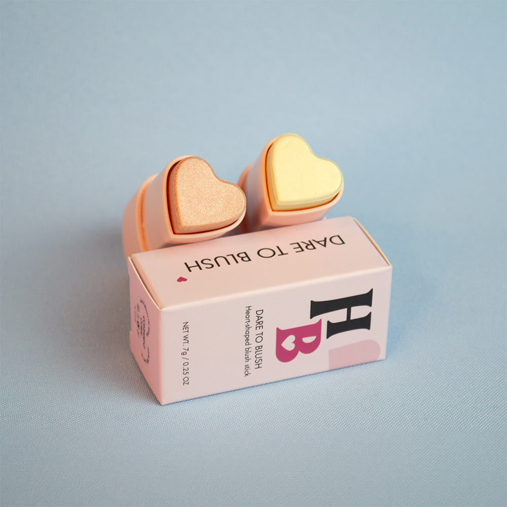 2 Dare to Blush heart-shaped highlighter sticks in shades Celestial and Ethereal