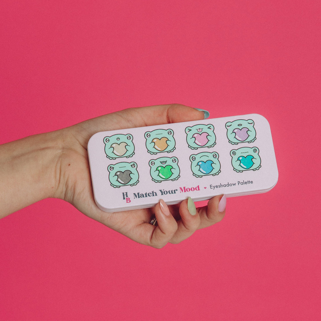 Picture of the outside of the Match Your Mood Palette which features cartoon frogs showcasing different moods.