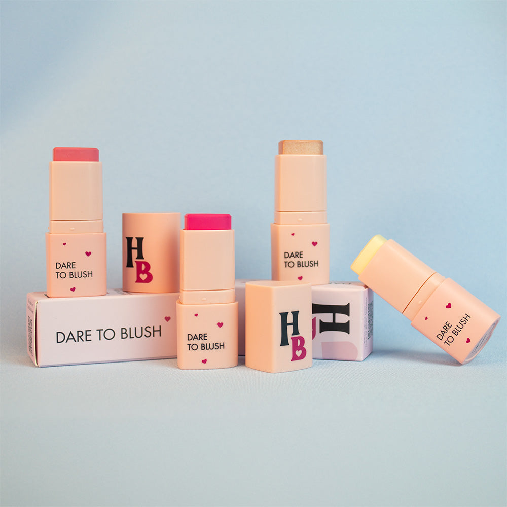 the Dare To Blush heart-shaped blush stick in shades Protagonist Pink, Positive Peony, Celestial and Ethereal