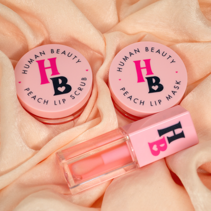 The Peach Please! bundle on a peach fabric, including the limited edition peach scent You&