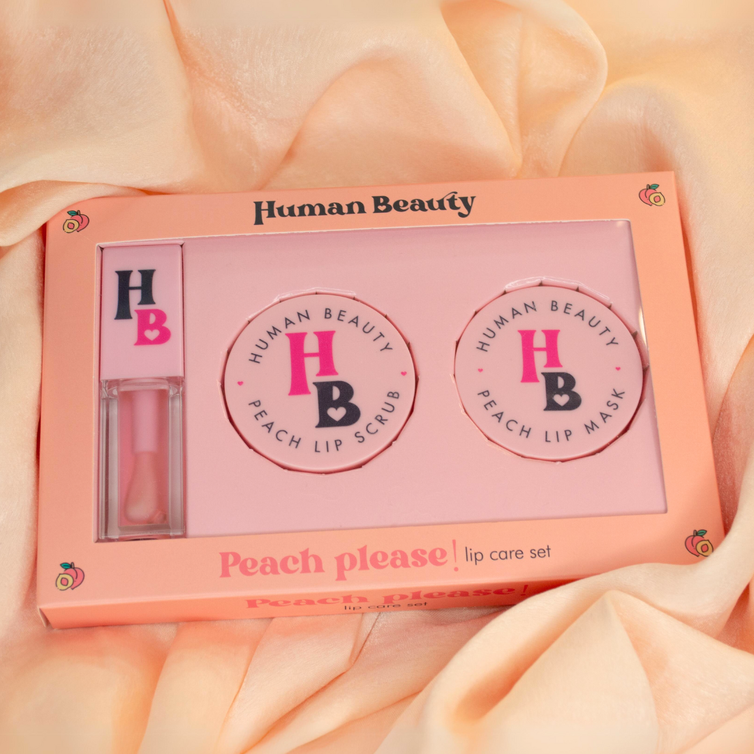 The Peach Please! limited edition lip kit in its collectible box on a peach fabric background