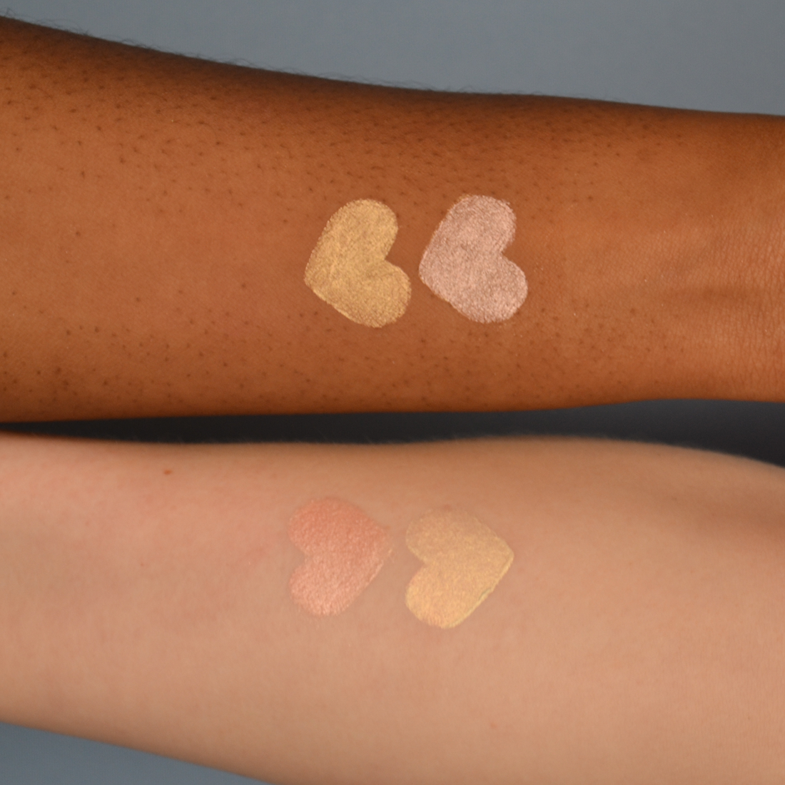Swatches of shades Celestial and Ethereal on 2 arms, one with dark skin and one with light skin
